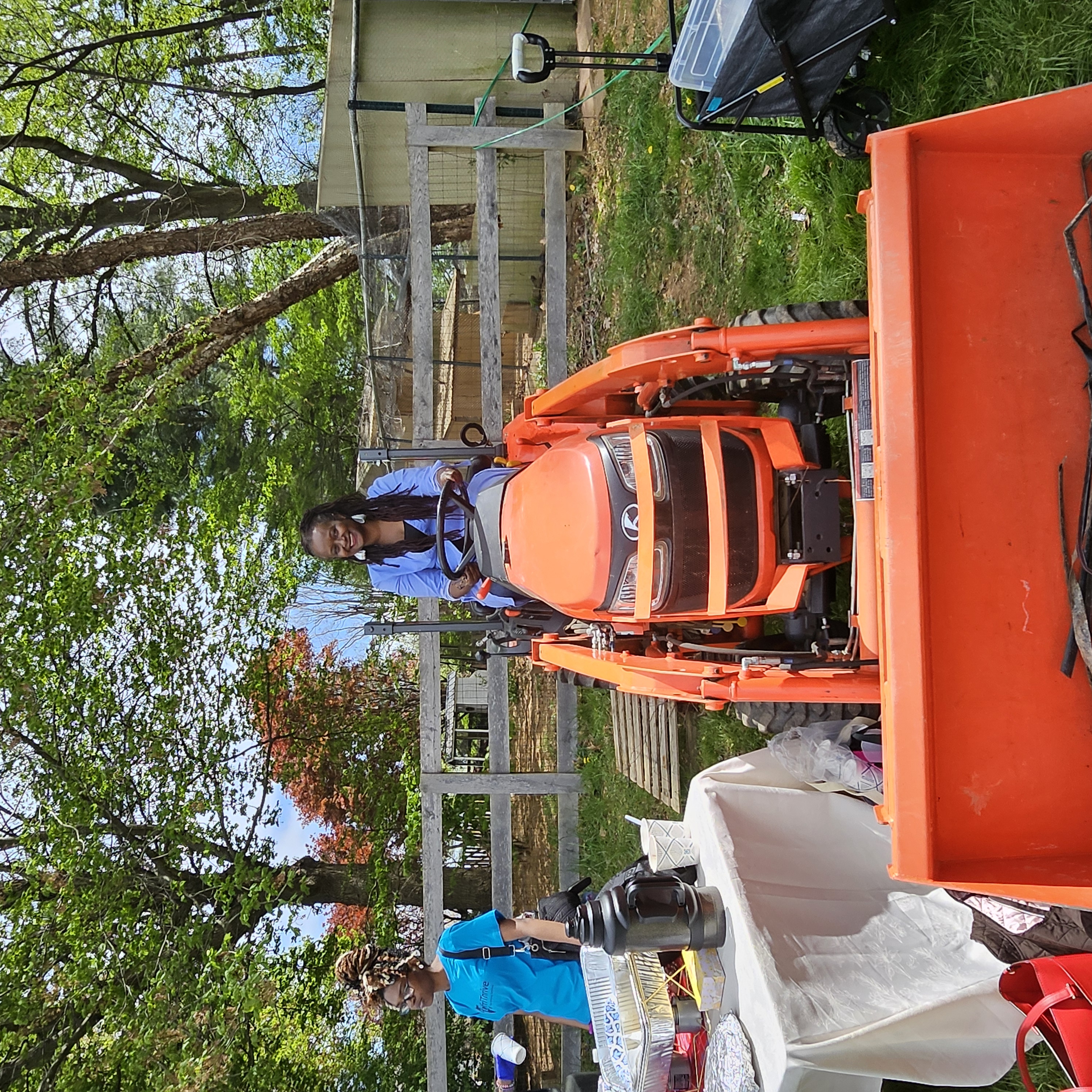 Fatmata on Tractor at Farm